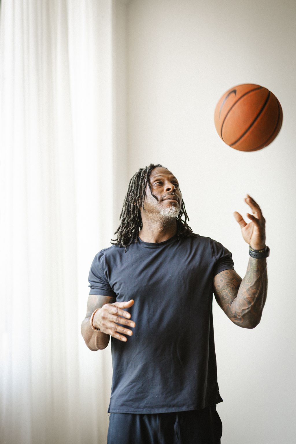 Coach Jamal Powers on the court